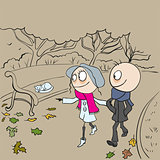 Loving couple walking in autumn park. Boy and girl walking in autumn park