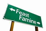 Feast or Famine road sign isolated.