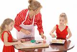 Grandmother baking cookies with children isolated on white