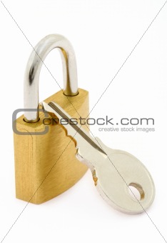 padlock and key on white