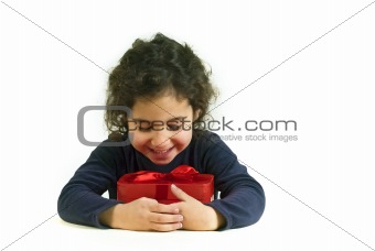 little girl holding present