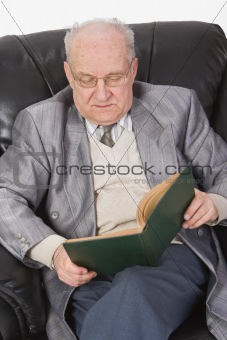 Senior reading a book