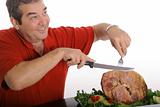 man slicing a ham isolated on white