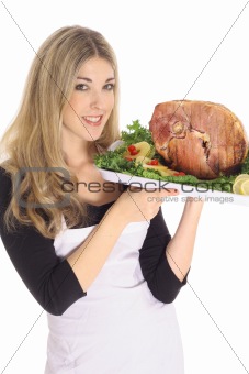 gorgeous woman serving a ham isolated on white