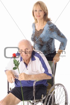 shot of a handicap elderly man with younger woman