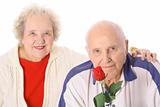 shot of a senior couple with a beautiful rose