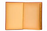 Yellowed and aged blank pages of an open book with red cover. Isolated on a white background with clipping path.