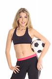 shot of a fitness woman holding soccer ball
