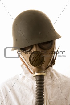 Person in gas mask and helmet