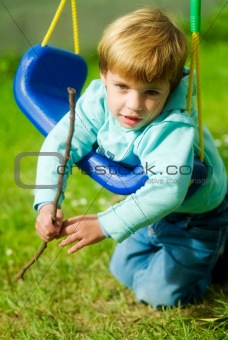 boy in swing