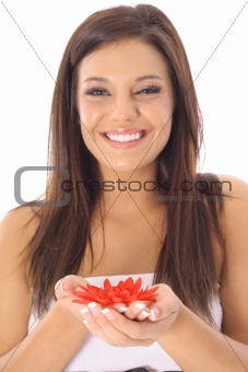 shot of a happy latino woman holding flowers