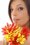 shot of a beautiful latino woman holding flowers