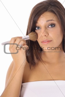 shot of a model applying makeup