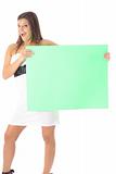 shot of a pretty girl holding a green blank sign vertical