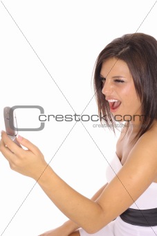 shot of an angry woman screaming at phone