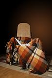 Rocking-chair with plaid