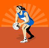 Netball player about to pass ball