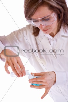 Woman researcher with flasks