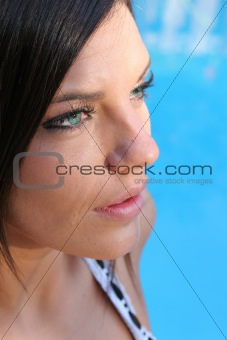 shot of a gorgeous girl headshot by pool