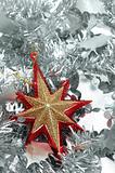 Christmas star over silver garland