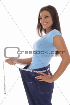 shot of a weight loss success with measuring tape belt