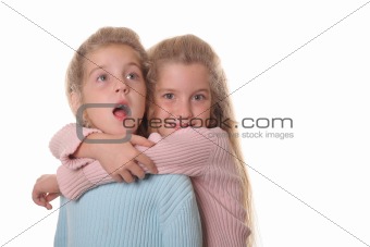 shot of twin sisters surprise