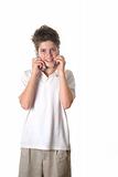 shot of a young boy talking on two cell phones full shot