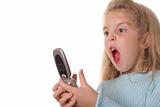 shot of an angry little girl screaming on cellphone