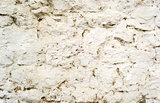 Background of old cracked painted stone wall with cement