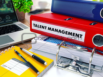 Talent Management on Red Ring Binder. Blurred, Toned Image.