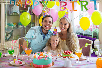 Smiling family with child