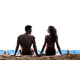 couple sitting rear view on the beach