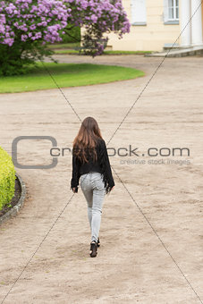 fashion girl is walking in the park 