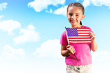 Composite image of little girl with american flag