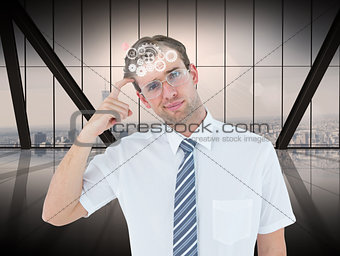 Composite image of geeky businessman thinking with finger on temple