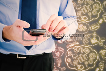 Composite image of close up of a businessman using a smartphone