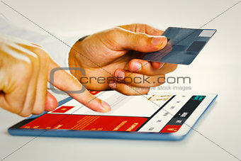 Composite image of man shopping with tablet pc