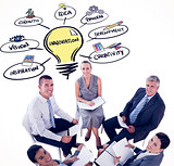 Composite image of business team sitting in circle and discussing