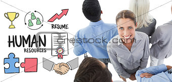 Composite image of businesswoman looking at camera with her colleague around her
