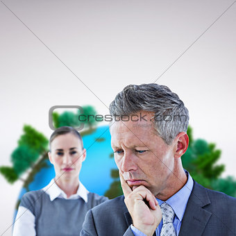Composite image of business team thinking