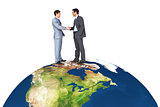 Composite image of businessmen shaking hands