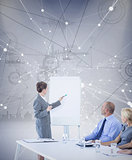 Composite image of business people looking at meeting board during conference