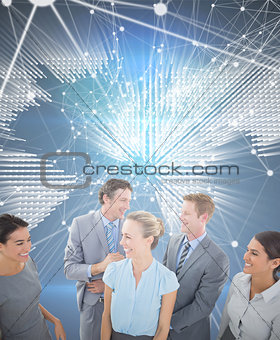 Composite image of happy business team smiling at each other