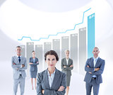 Composite image of businesswoman colleagues arm crossed