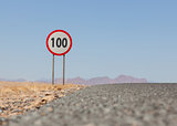 Speed limit sign at a desert road in Namibia