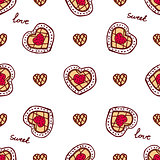 Seamless pattern with doodle heart shaped cookies