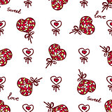 Seamless pattern with doodle heart shaped lollipops