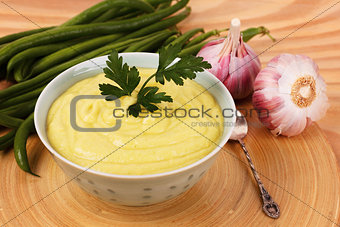 Vegetable cream soup of green beans with parsley and garlic 