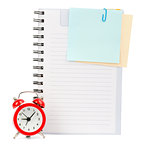 Copybook with stickers and alarm clock