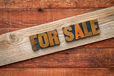 For sale sign in wood type
